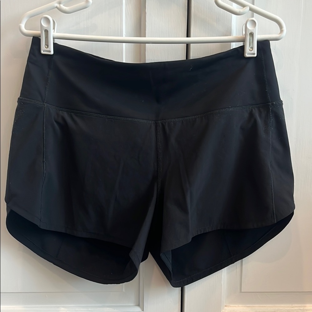 EUC Lululemon women’s split run shorts. Size 8